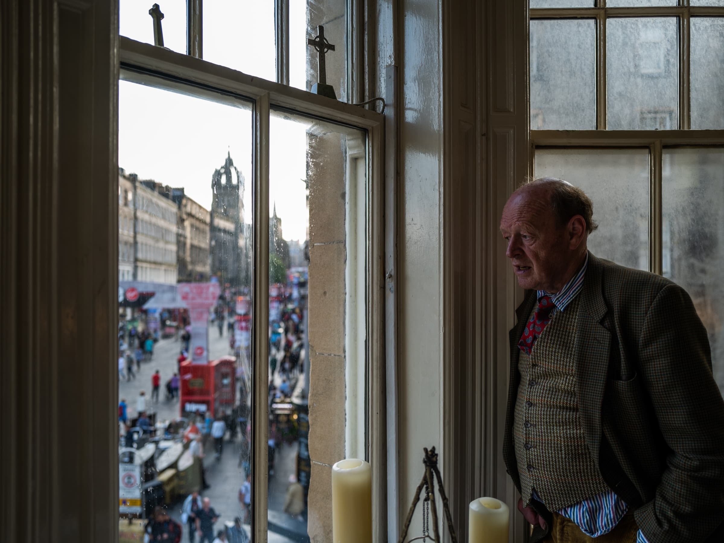 Man by a window in Edinburgh