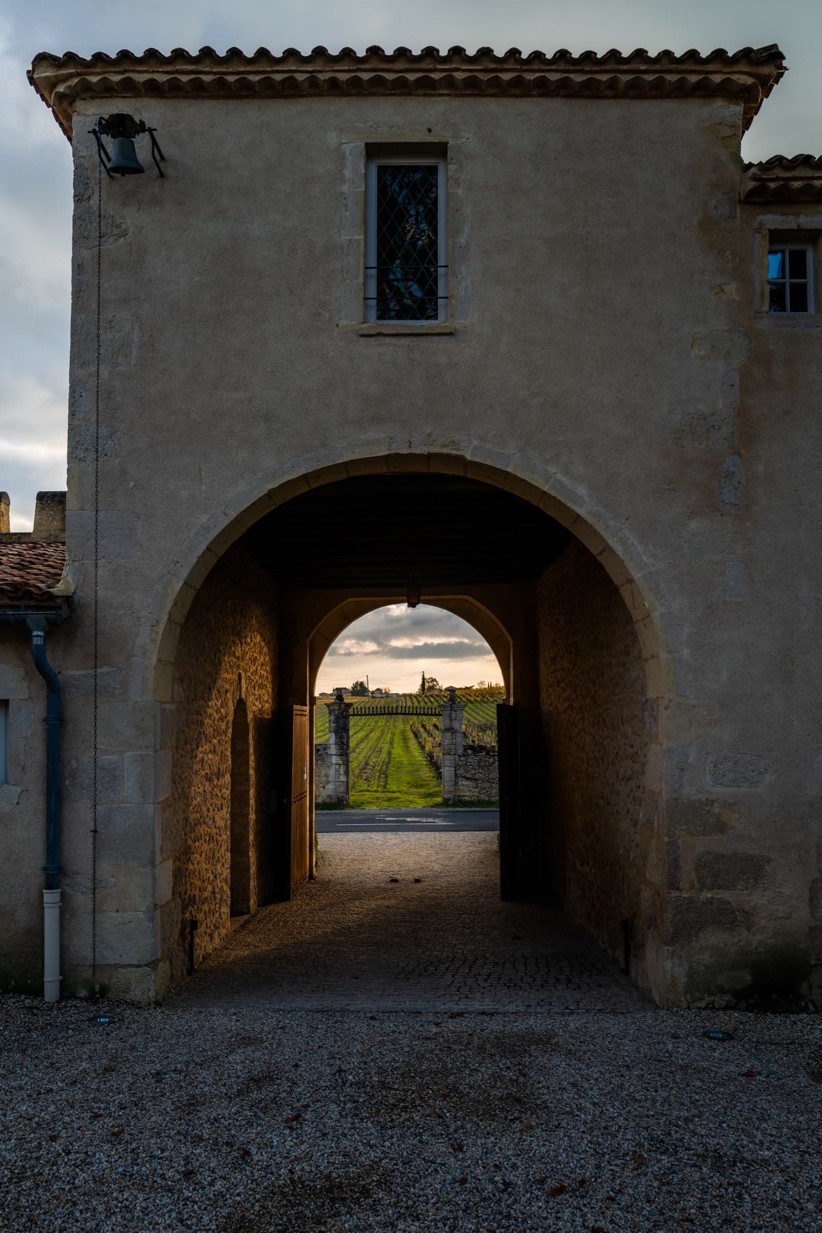 Stone archway to a Bordeaux vineyard